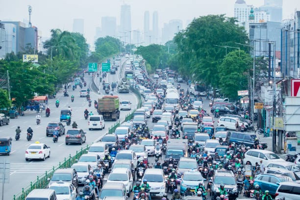 JAKARTA - Indonesia. August 27, 2019: Aerial view of traffic jam with crowded vehicles in Jakarta city