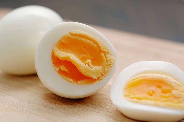 sliced boiled and peeled hens egg