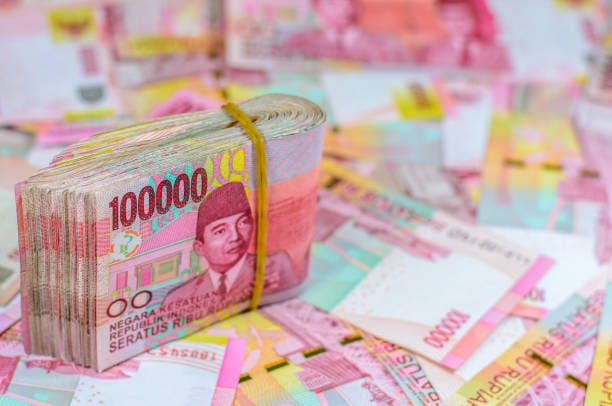 Background and texture of Indonesian Rupiah currency ,money banknotes ,Focus on number 1 on banknote